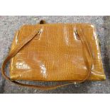 A Louis Feraud brown hide crocodile skin effect handbag OS2