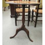 A late Victorian mahogany pedestal table with a checkerboard top,