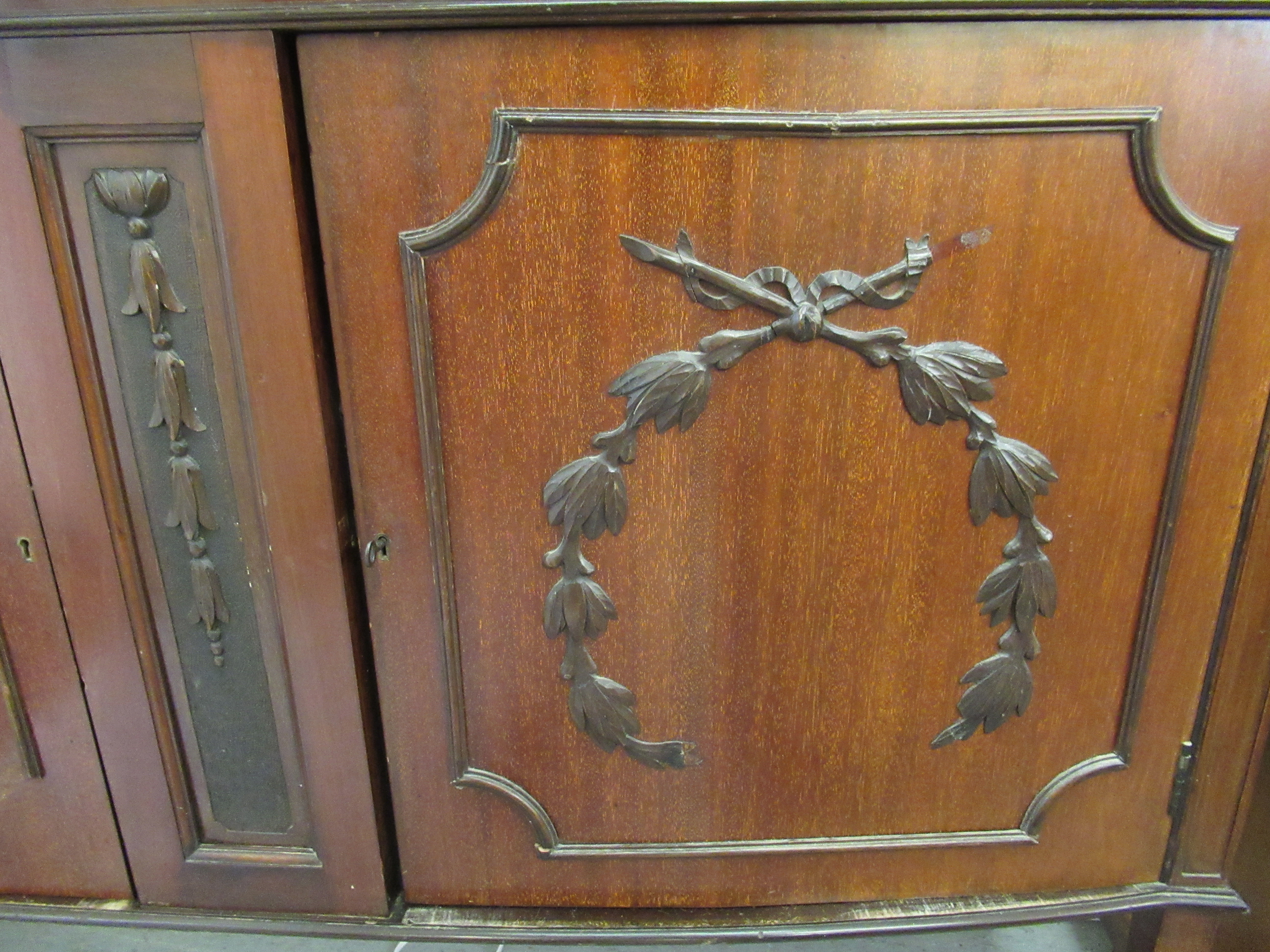 An Edwardian mahogany display cabinet with a pair of glazed doors, over a bow front, - Image 4 of 4