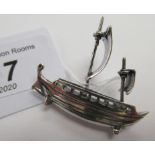A silver coloured metal miniature model sailing vessel 11