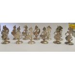 Twelve Indonesian silver coloured metal menu holders,