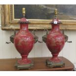 A pair of 20thC Japanese inspired and gilded china pedestal vase design table lamps with gilt metal