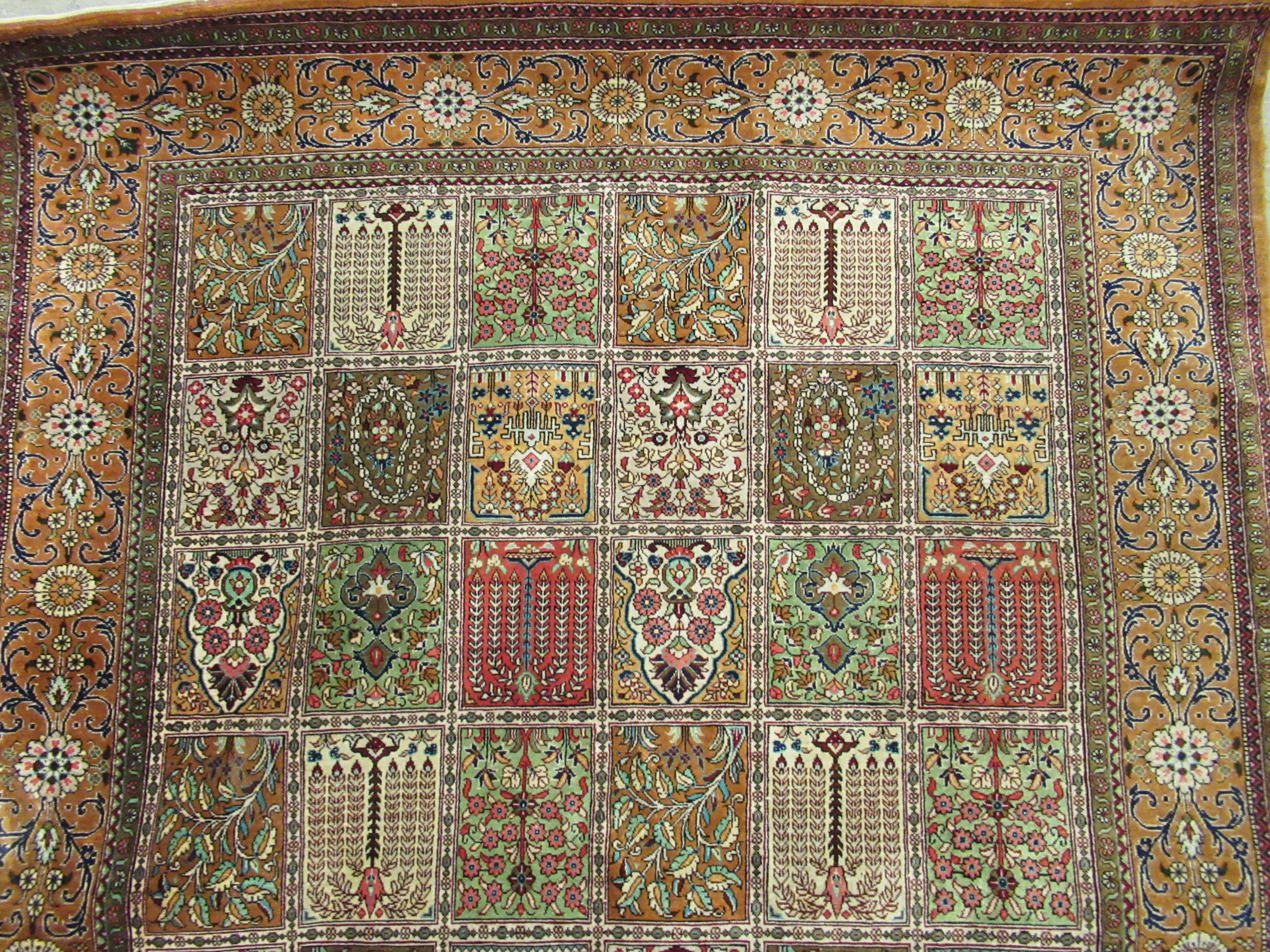 A Persian part silk/part woollen rug, decorated with repeating rectangular panels, - Image 4 of 8