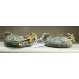 A pair of Oriental cast and patinated green and gilt censers,