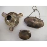 Silver collectables: to include an early 20thC oval purse with engraved swag decoration Birmingham