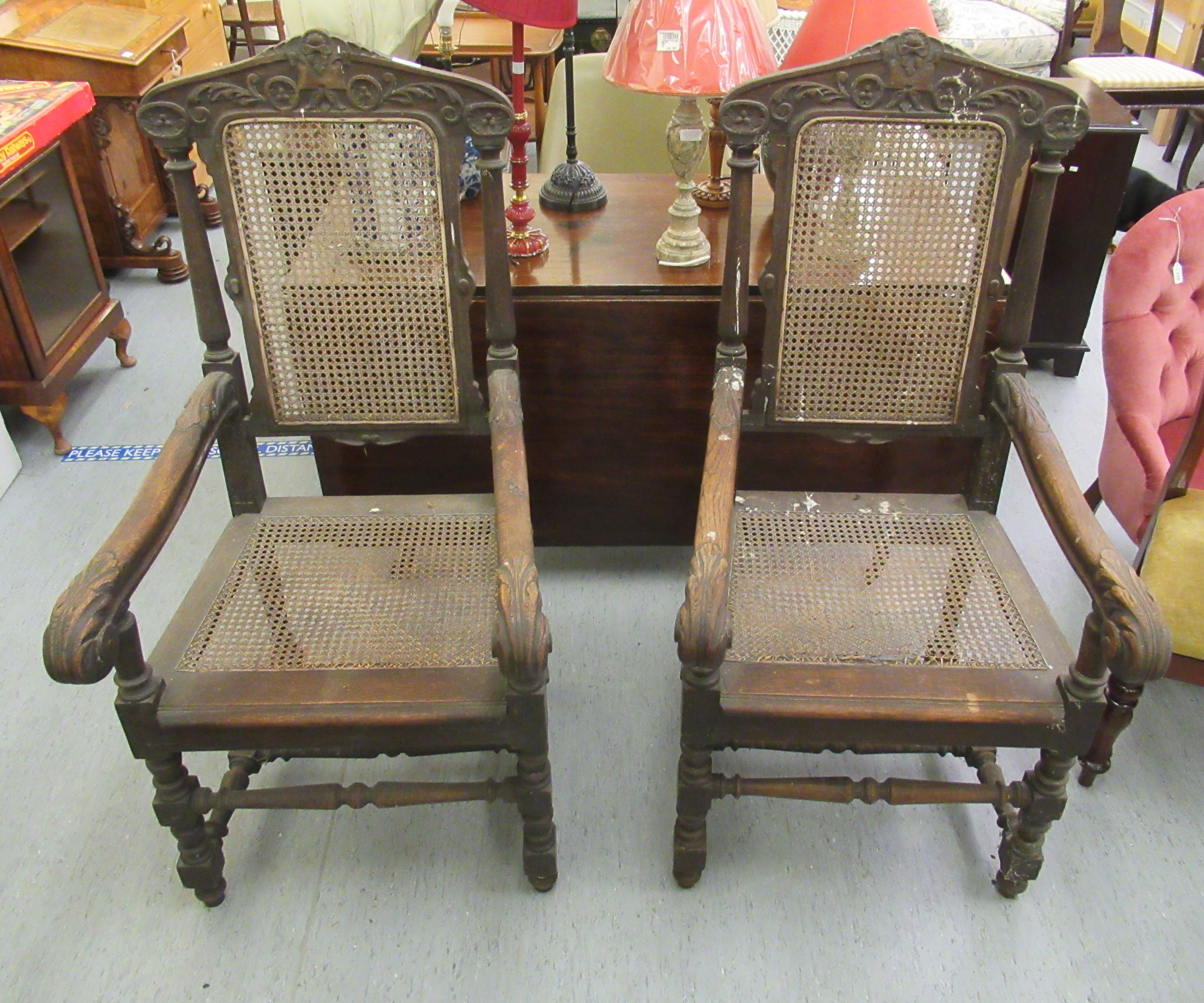 A pair of late 19thC baronial style, oak framed, high back chairs with carved crests, side pillars, - Image 2 of 4