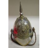 A Duke of Lancaster Yeomanry spiked white metal helmet with a chinstrap (Please Note: this lot is