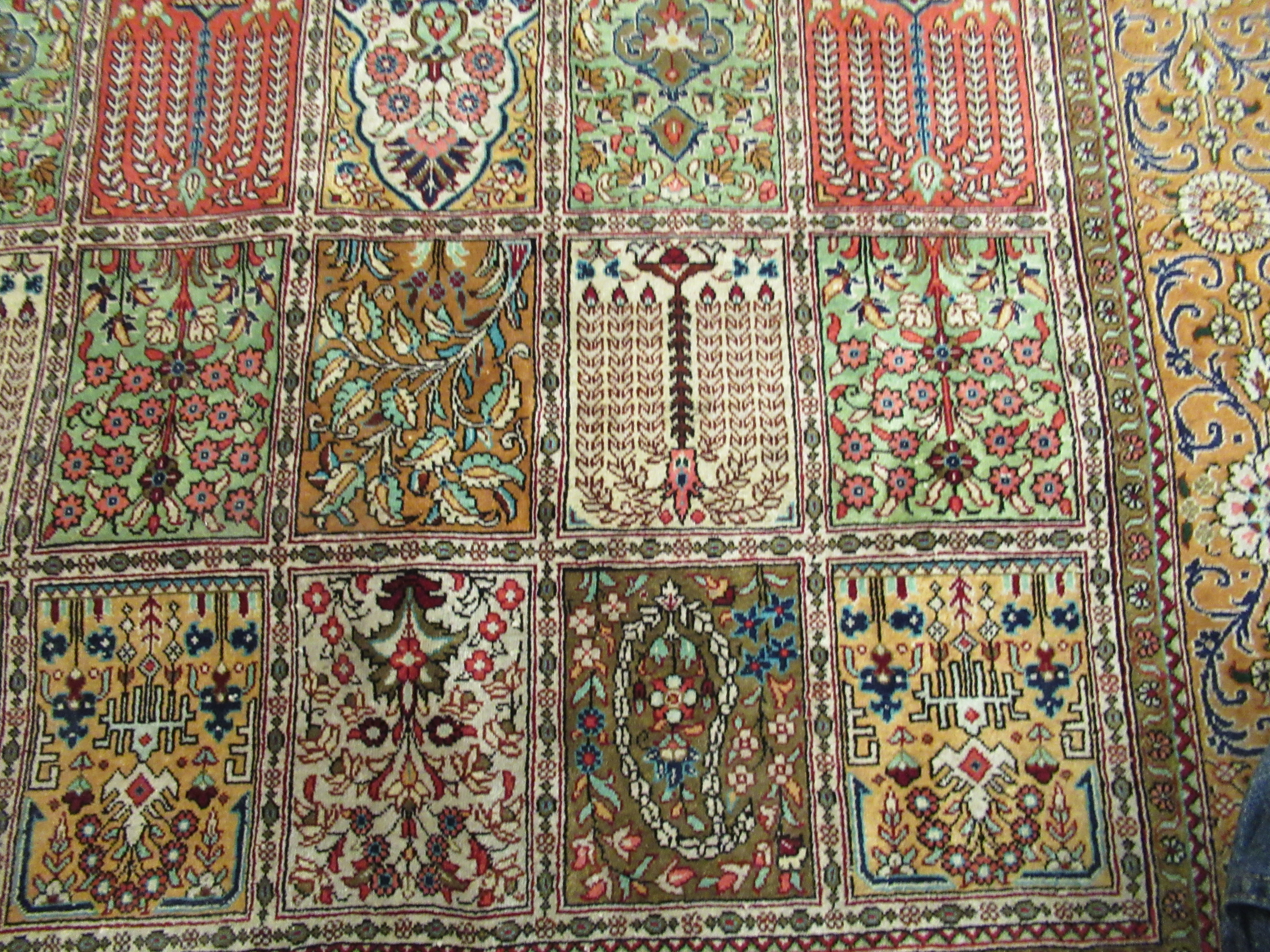 A Persian part silk/part woollen rug, decorated with repeating rectangular panels, - Image 5 of 8