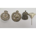 Two silver military regimental cap badges the The Rifle Brigade and The Green Jackets;