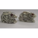 A pair of silver plated novelty salt and pepper pots,