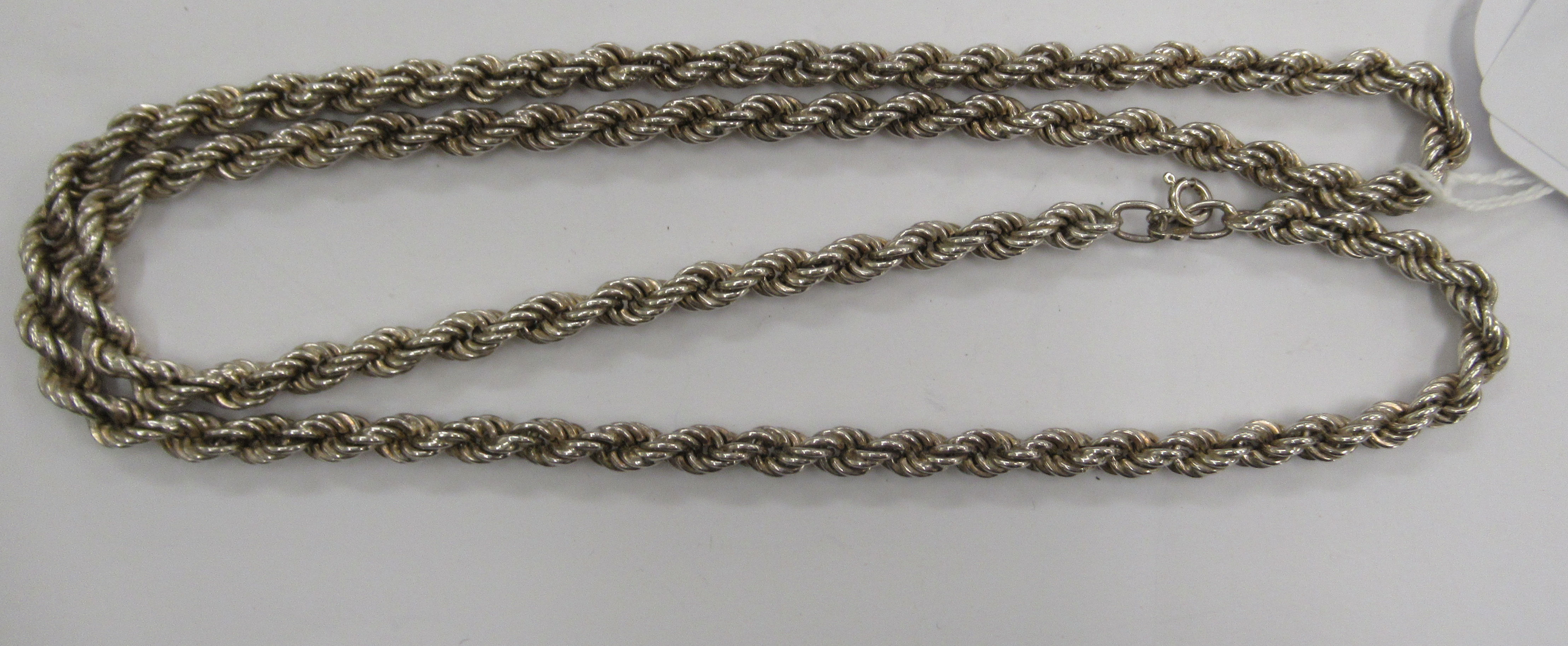 A silver coloured metal ropetwist neckchain 11