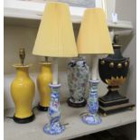 A pair of modern sand coloured china baluster vase design table lamps 13''h;