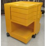 A Joe Colombo Boby trolley, in moulded yellow plastic,