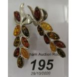 A pair of silver and multi-coloured amber set earrings 11