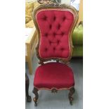 A late 19thC walnut framed button upholstered spoonback salon chair,