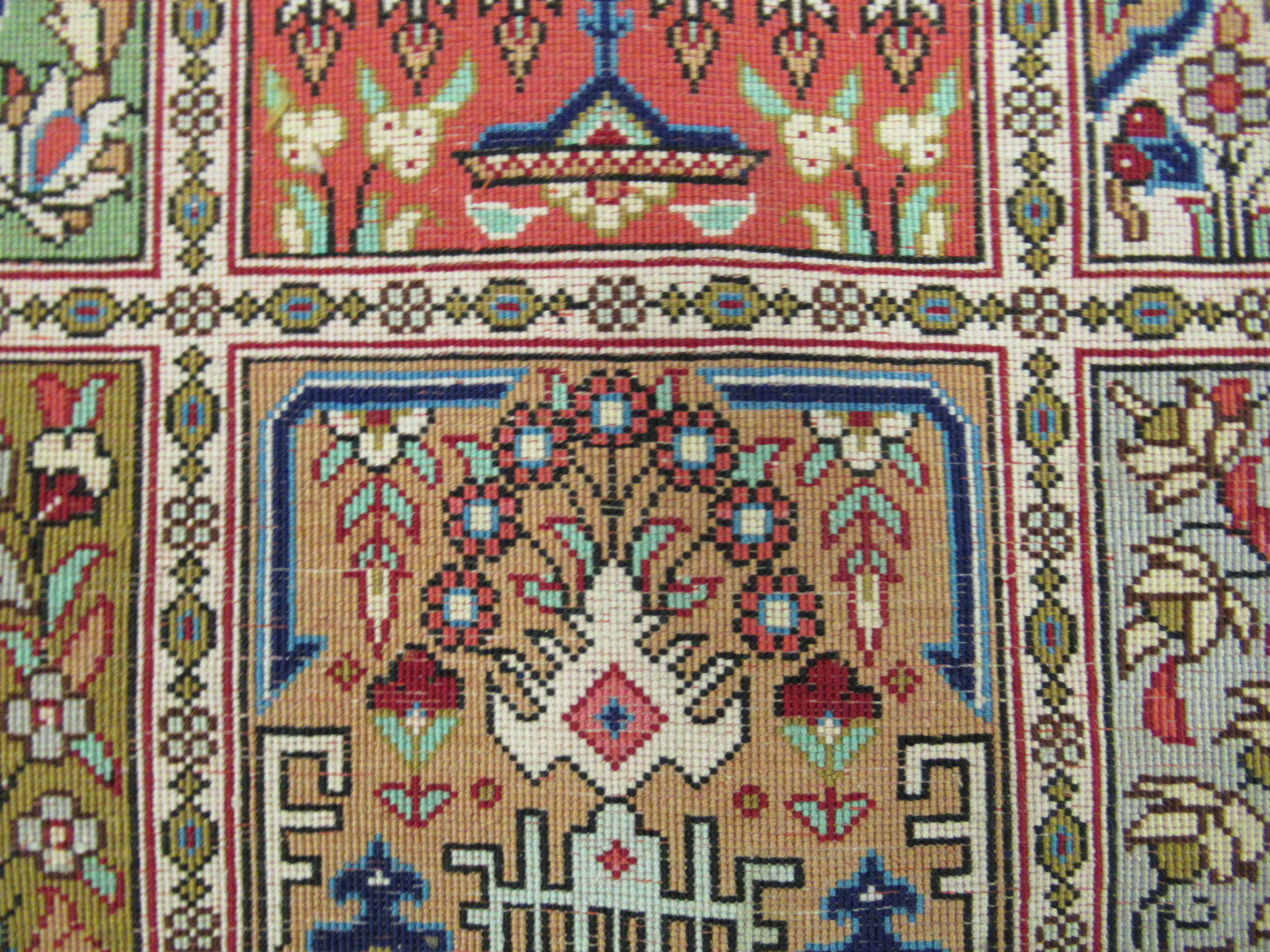 A Persian part silk/part woollen rug, decorated with repeating rectangular panels, - Image 8 of 8