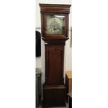 An early 19thC mahogany and oak longcase clock;