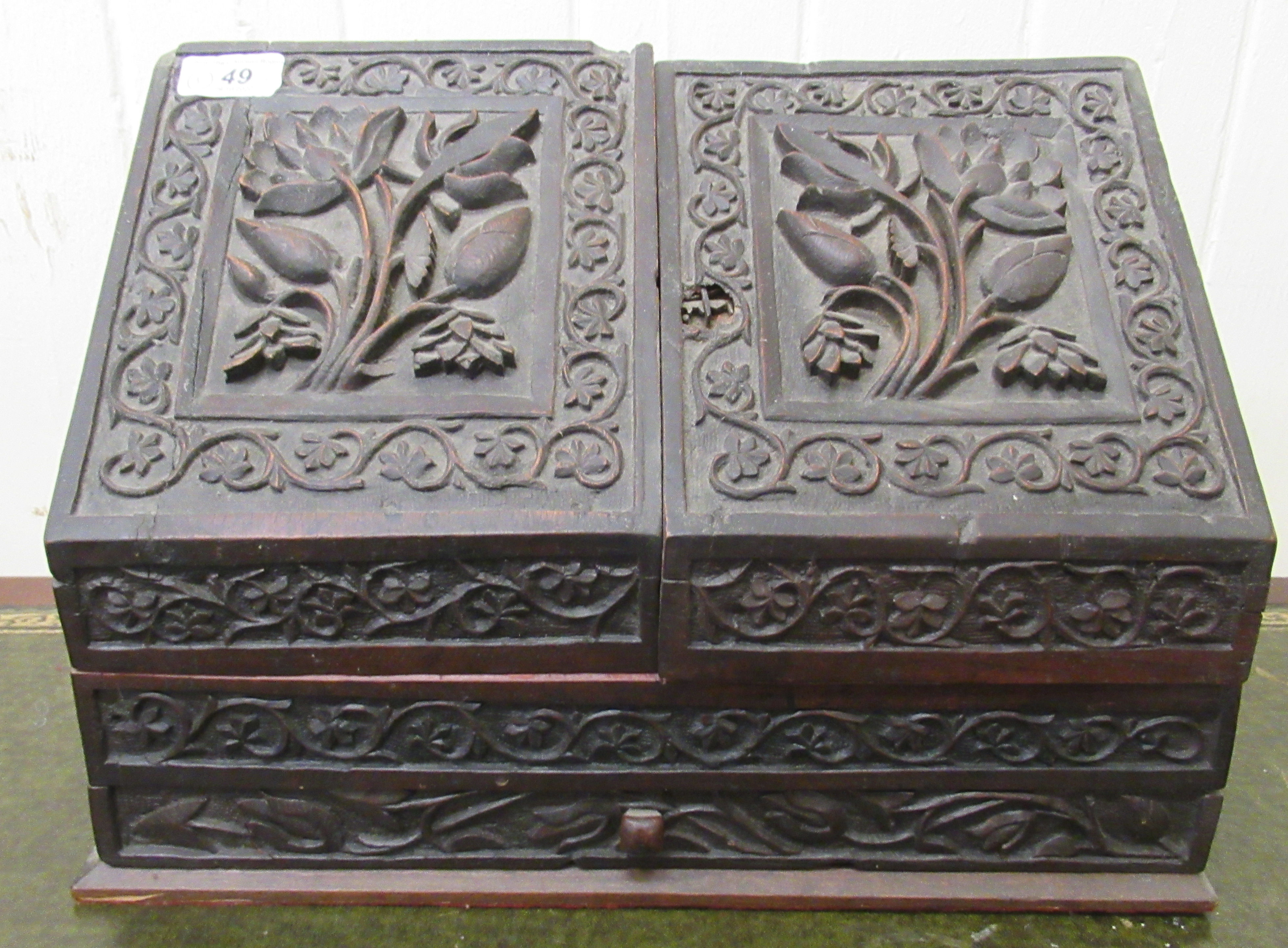 A late Victorian carved oak desktop stationary box,