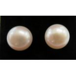 A pair of silver coloured metal and pearl set earrings 11