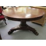 An early 19thC mahogany breakfast table,