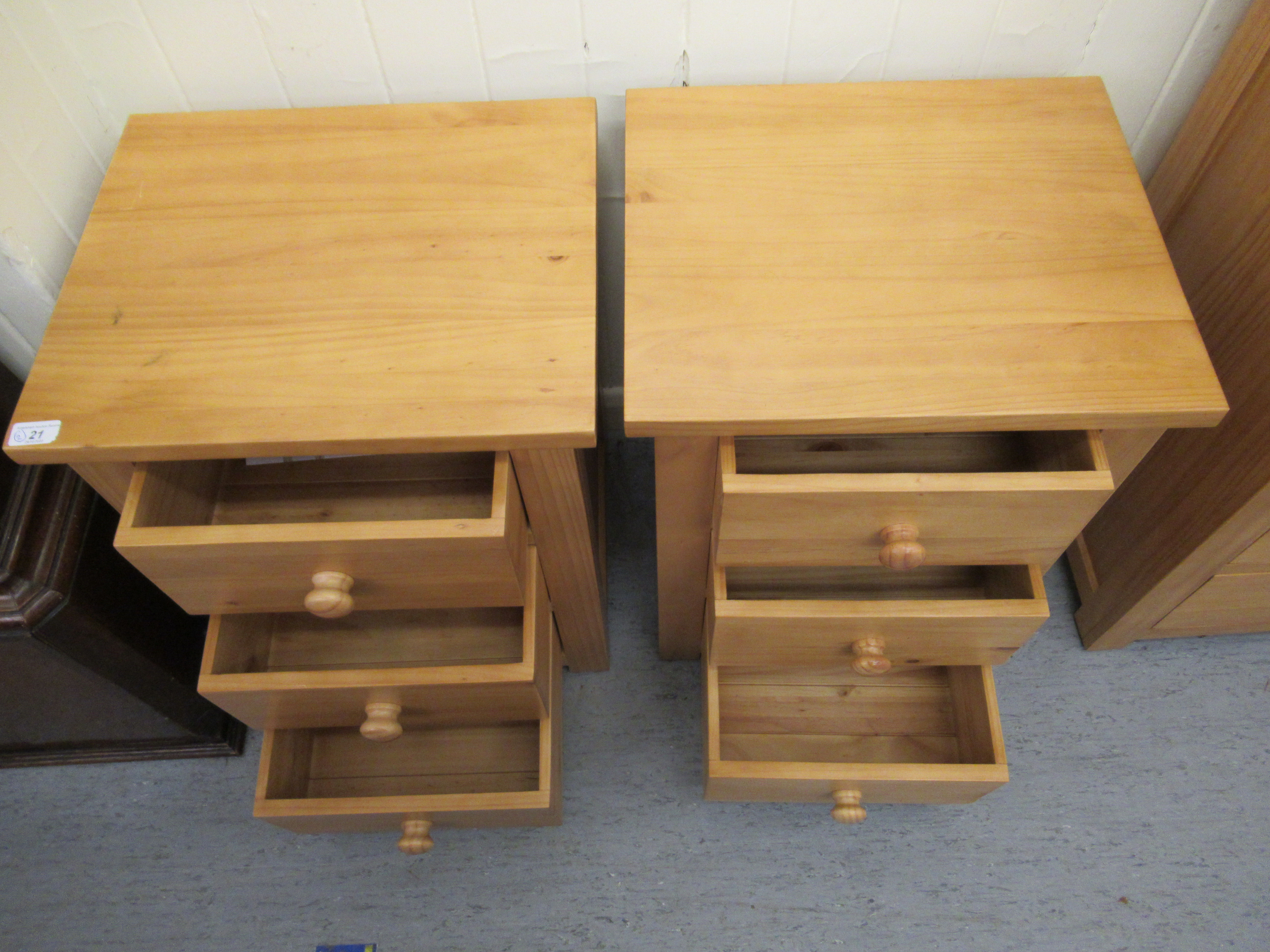 A pair of modern Cotswold Oakley pine three drawer bedside chests, - Image 2 of 2