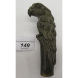 A cold painted bronze walking cane handle, fashioned as a parrot,