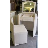 A modern faux cream coloured stitched hide covered vanity unit of oval from,