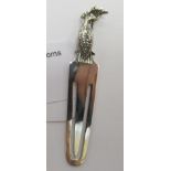 A silver coloured metal bookmark with a perched parrot finial 11