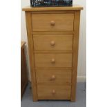 A modern Cotswold Oakley pine five drawer pedestal chest,