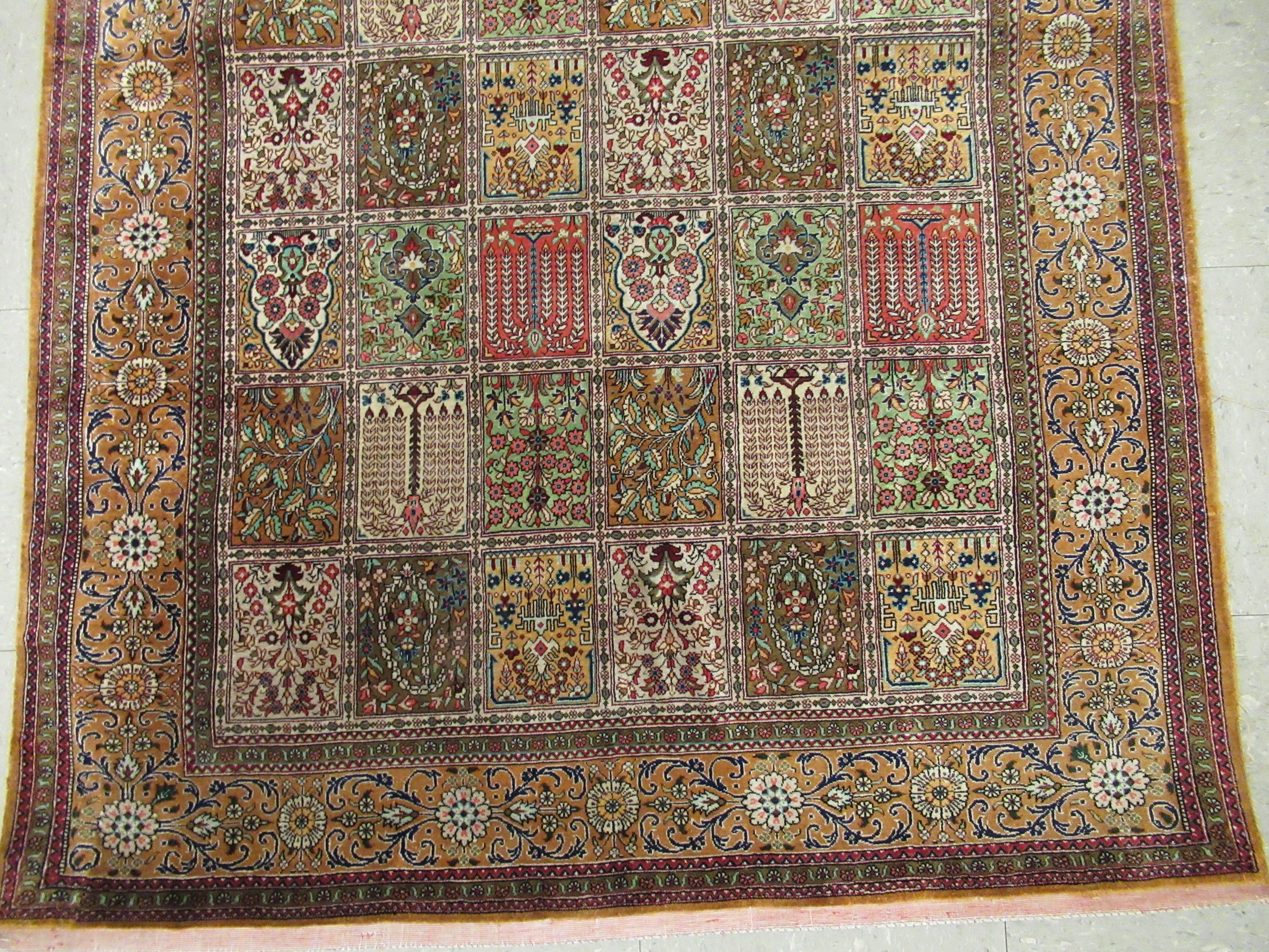 A Persian part silk/part woollen rug, decorated with repeating rectangular panels, - Image 2 of 8