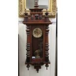 An early/mid 20thC mahogany and beech cased wall clock,