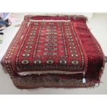 Four small Turkoman and other rugs,