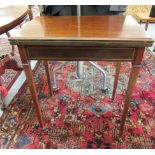 An Edwardian string inlaid mahogany card table,