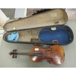 An early 20thC violin with a two piece back and inlaid purfled edge the back 14''L CS