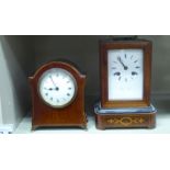 A late 19thC mahogany cased carriage style mantel clock with marquetry ornament;