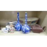 Oriental ceramics: to include a pair of Chinese bottle vases of bulbous form with long,