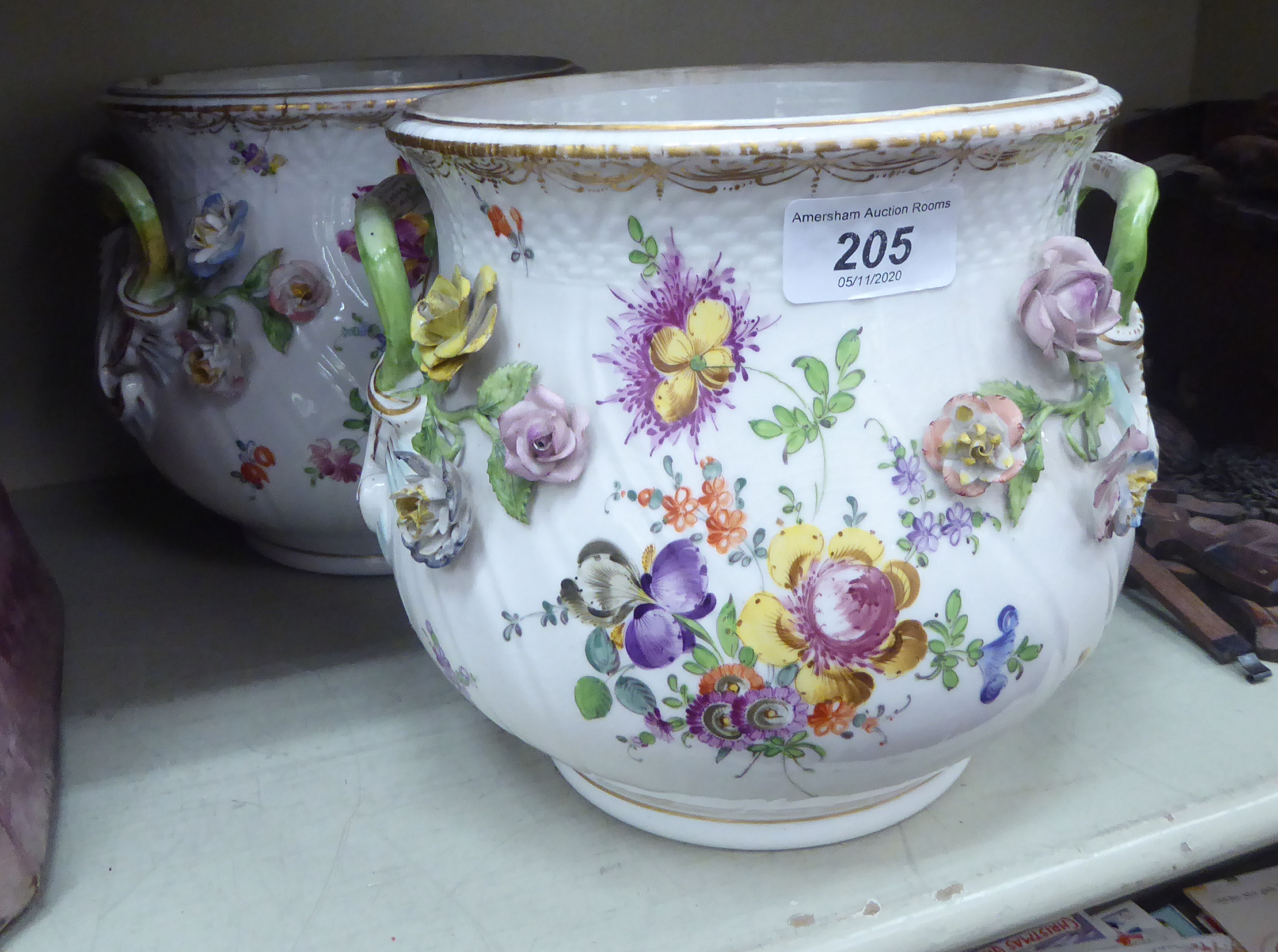 A pair of late 19thC Dresden porcelain jardinieres,