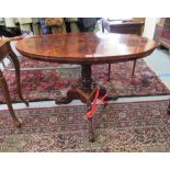 A late Victorian mahogany occasional table with an oval top,