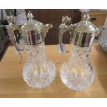 A pair of modern glass claret jugs with silver plated collars and handles CA