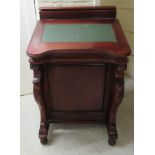 A modern Victorian style mahogany Davenport with a rising top compartment and a hinged lid,