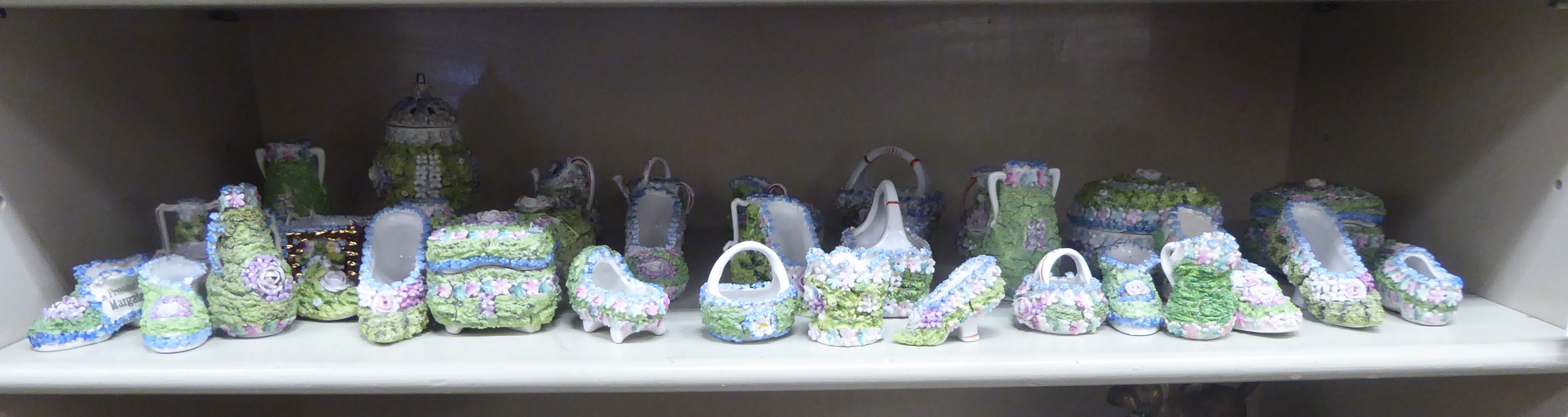 Continental porcelain vases, model shoes and ornaments,