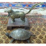 A mid 20thC steel novelty reception desk bell, fashioned as a tortoise,