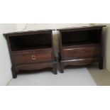 A pair of 20thC Stag mahogany bedside chests, each with an open shelf, over a long drawer,