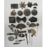 Sterling silver and other white metal, filigree and other brooches of ribbon,