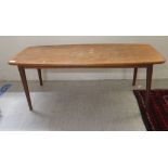 A 1970s teak coffee table,