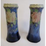 A pair of Royal Doulton stoneware vases of tapered, cylindrical form,