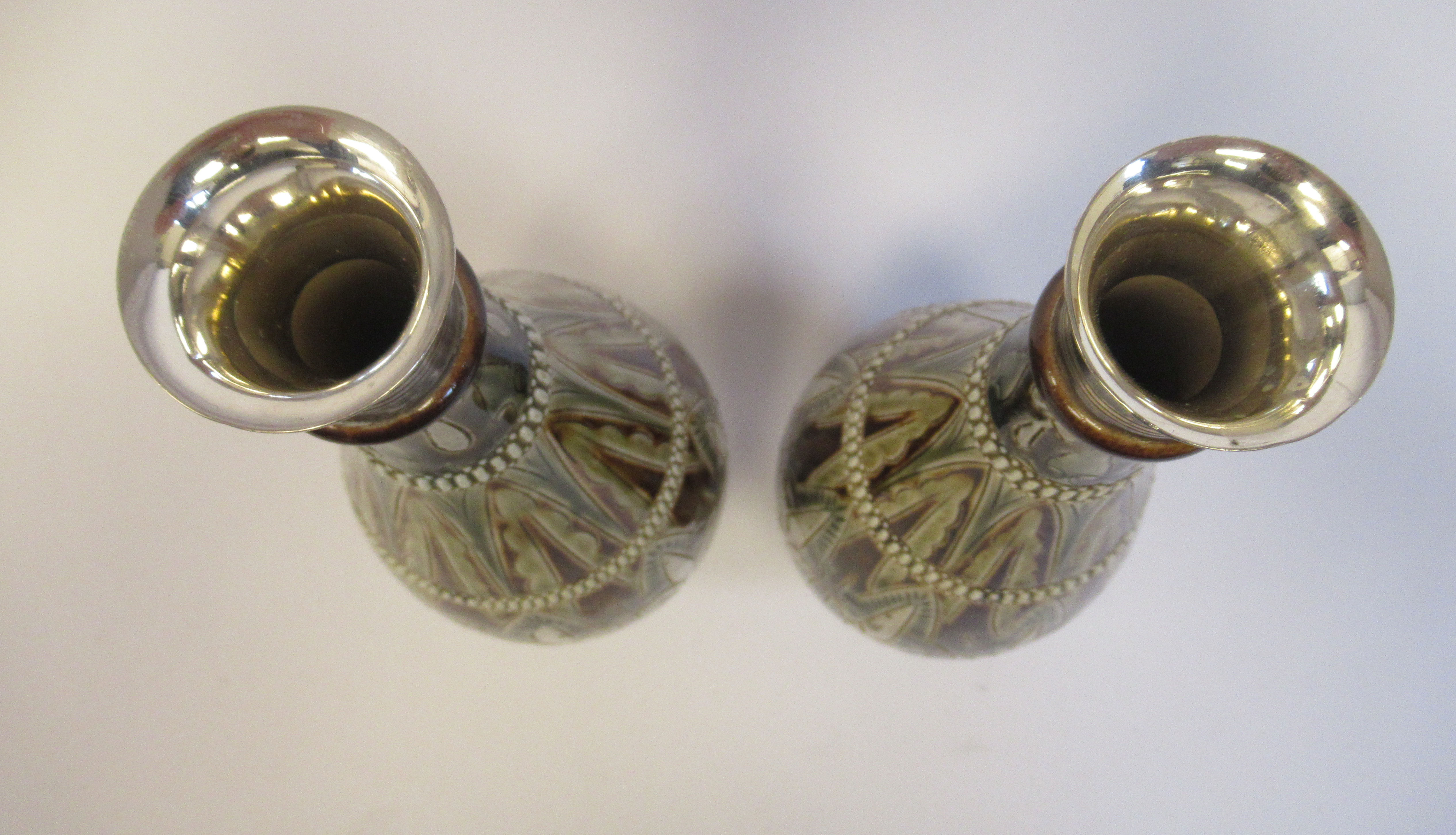 A pair of late Victorian Doulton Lambeth ovoid shaped stoneware bottle vases with applied silver - Bild 3 aus 6