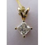 A 9ct gold claw set, single stone diamond pendant,