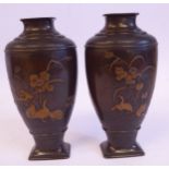 A pair of early 20thC Japanese bi-coloured, cast and patinated bronze vases of shouldered,