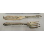 A pair of mid Victorian silver fish servers with decoratively pierced ornament,